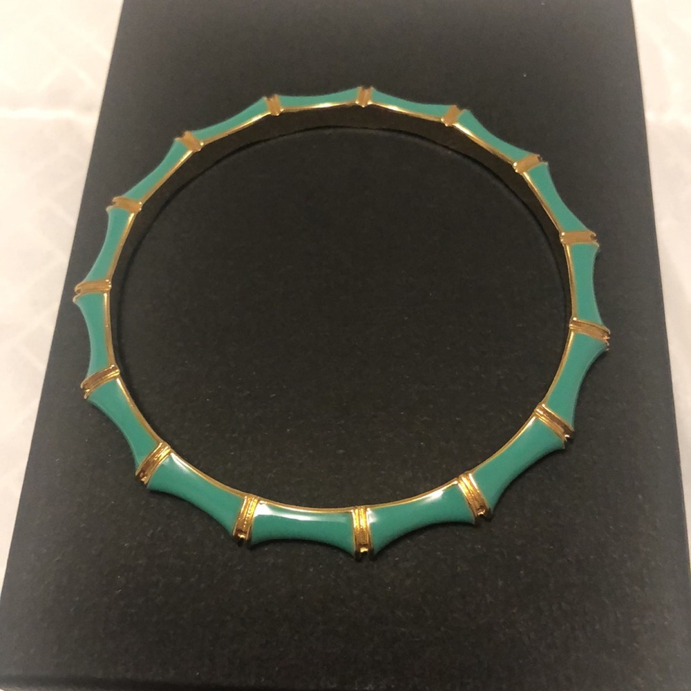 Stella and Dot retired gold metal and enamel bangle bracelets.